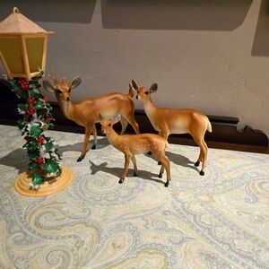 Antique plastic molded deer family and light post